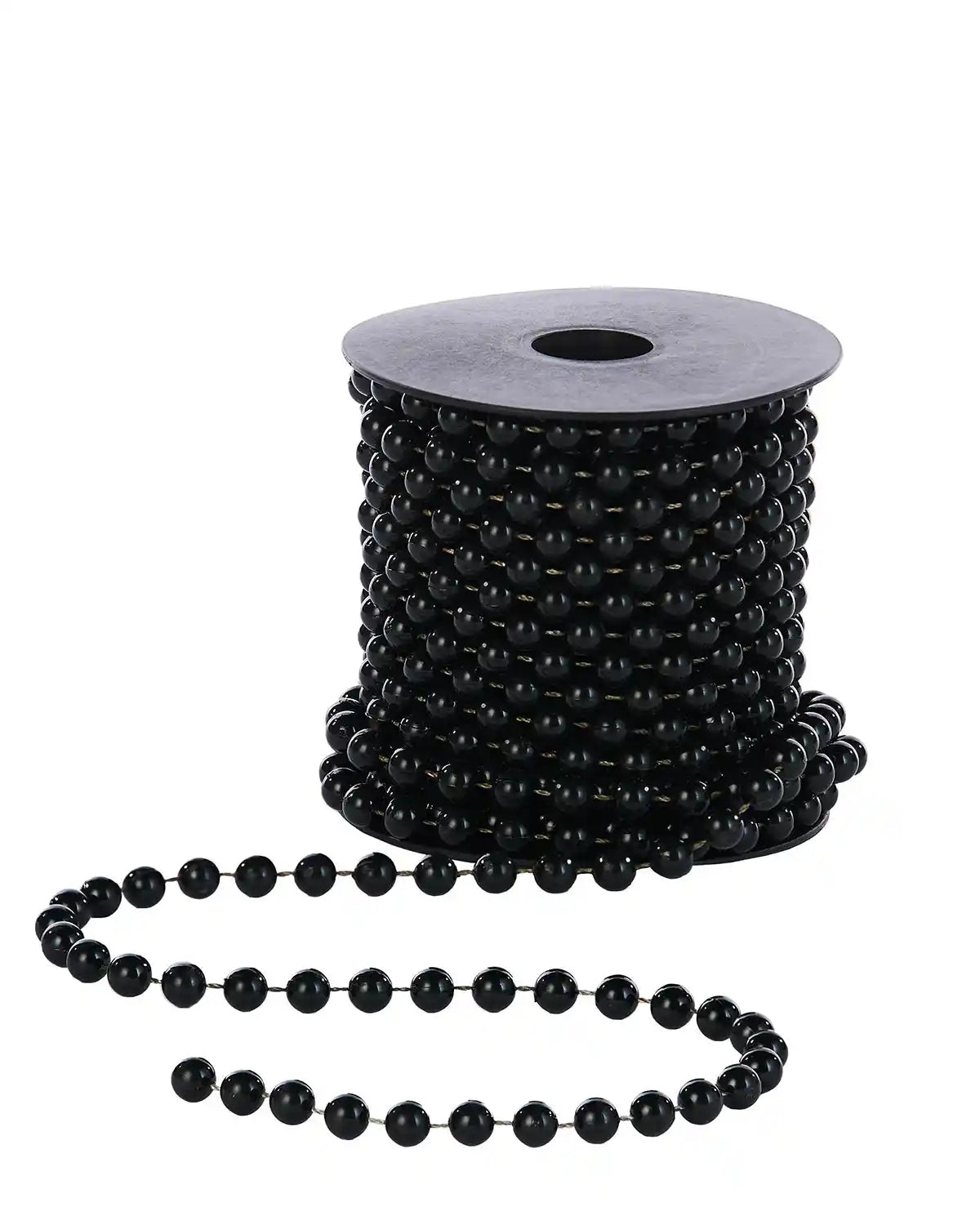 Black beaded garland in a spool on a white background