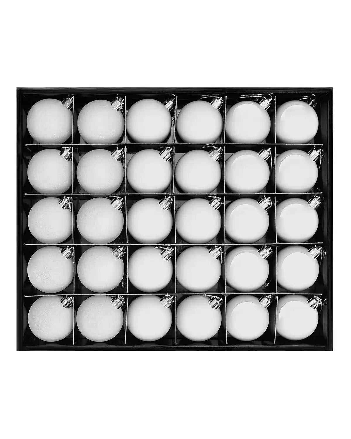 Box of white small Christmas baubles on a white background