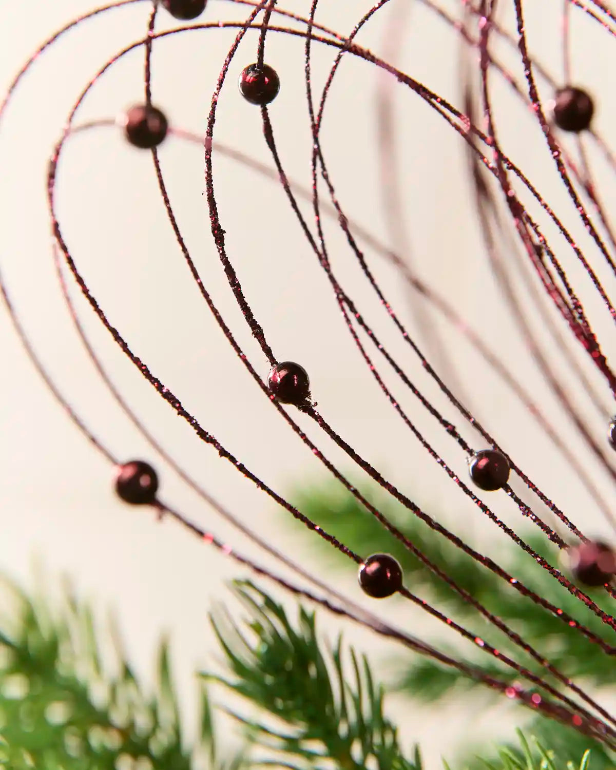 Burgundy Glitter Nest Christmas Tree Pick highlighting the glitter details and Burgundy balls
