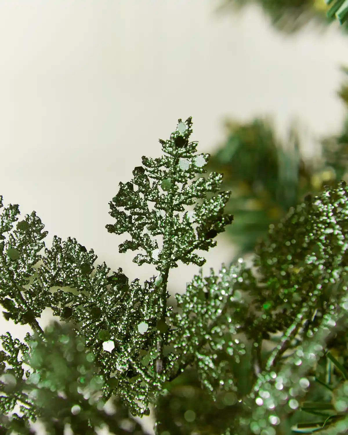 Close-up Sage green Glitter Leaf Pick, with green glitter and green sequins