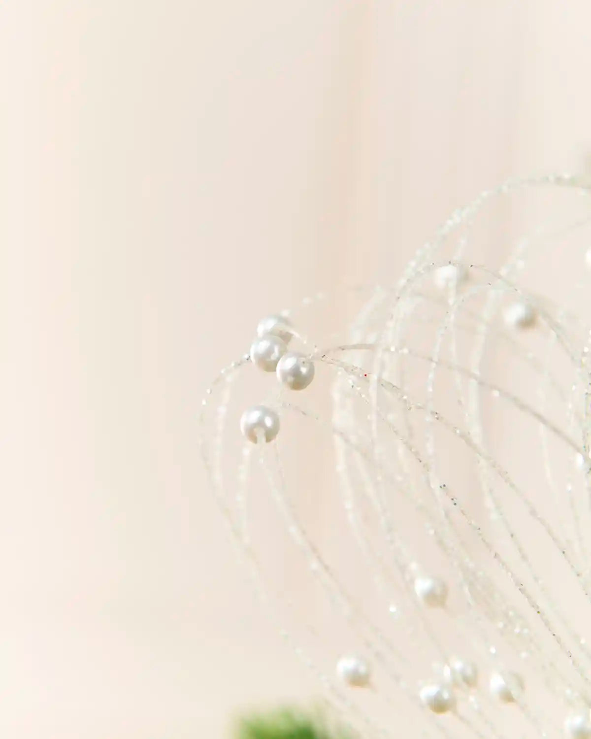 Close-up White Glitter Nest Christmas Tree Pick highlighting the glitter details and White balls