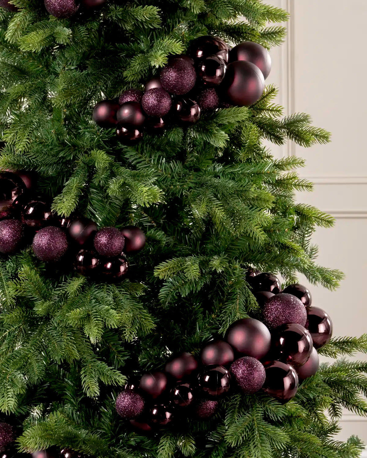 Close-up of a Burgundy Bauble Cluster Arch on a Christmas tree