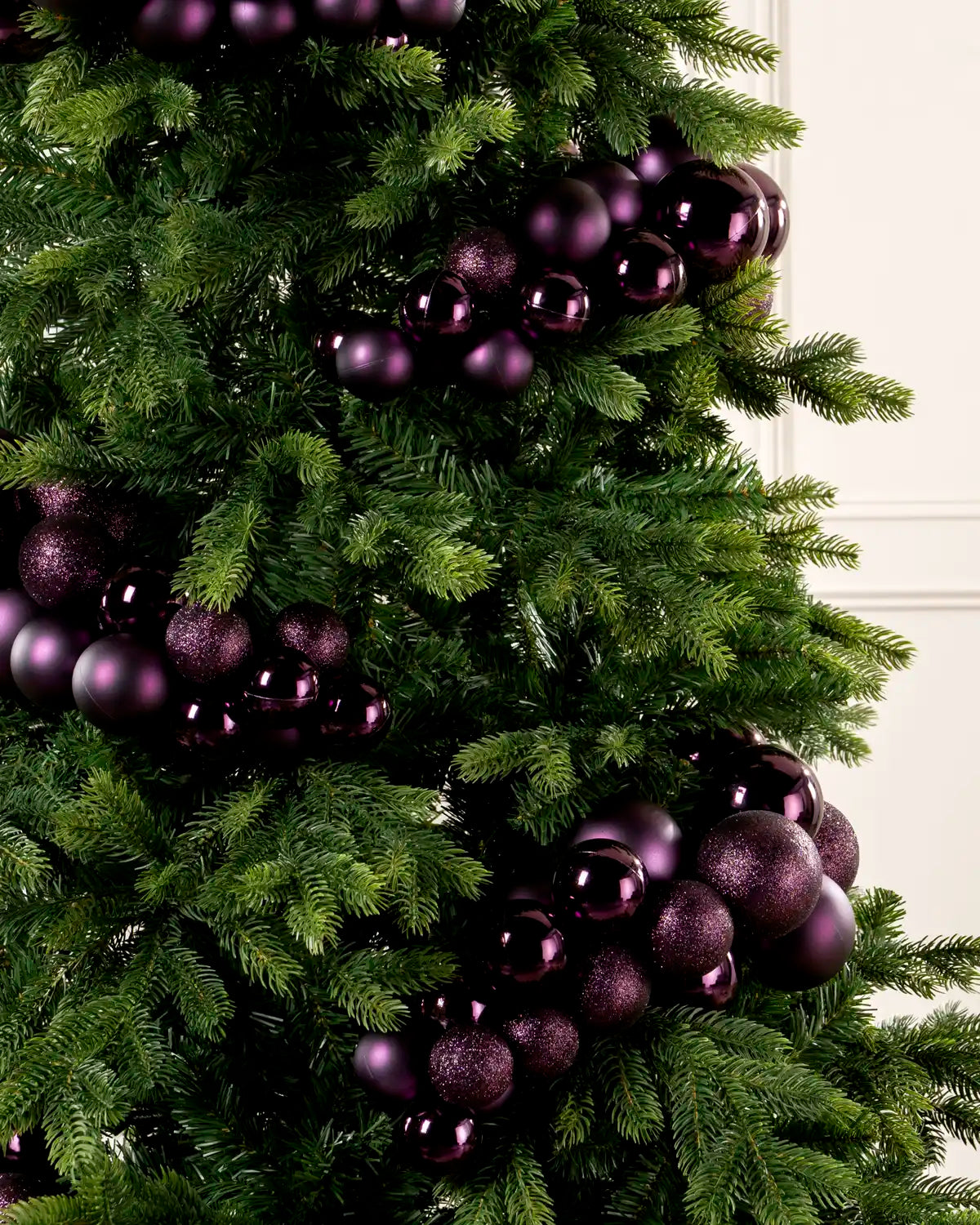 Close-up of a Purple Bauble Cluster Arch on a Christmas tree