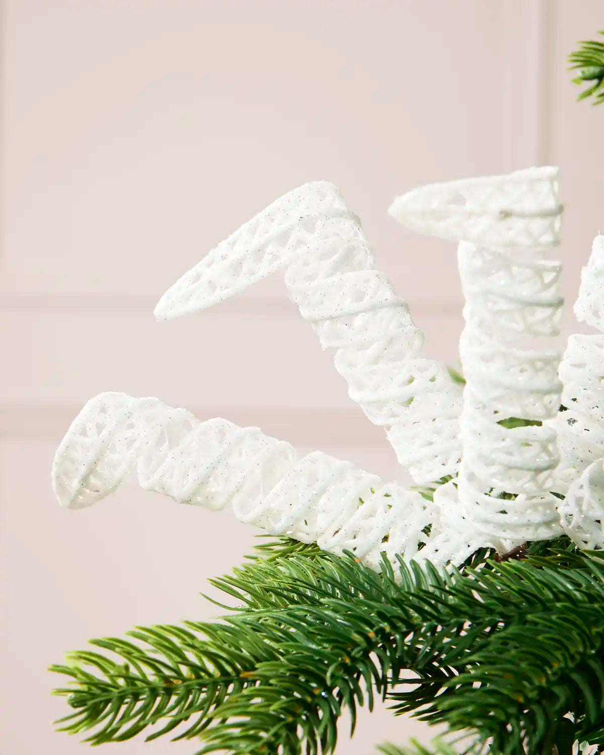 Close-up of a White Glitter Spiral Pick showing its textured spiral design