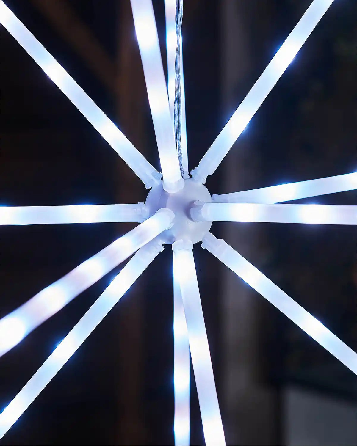 Close-up of a white LED light strip on a dark background
