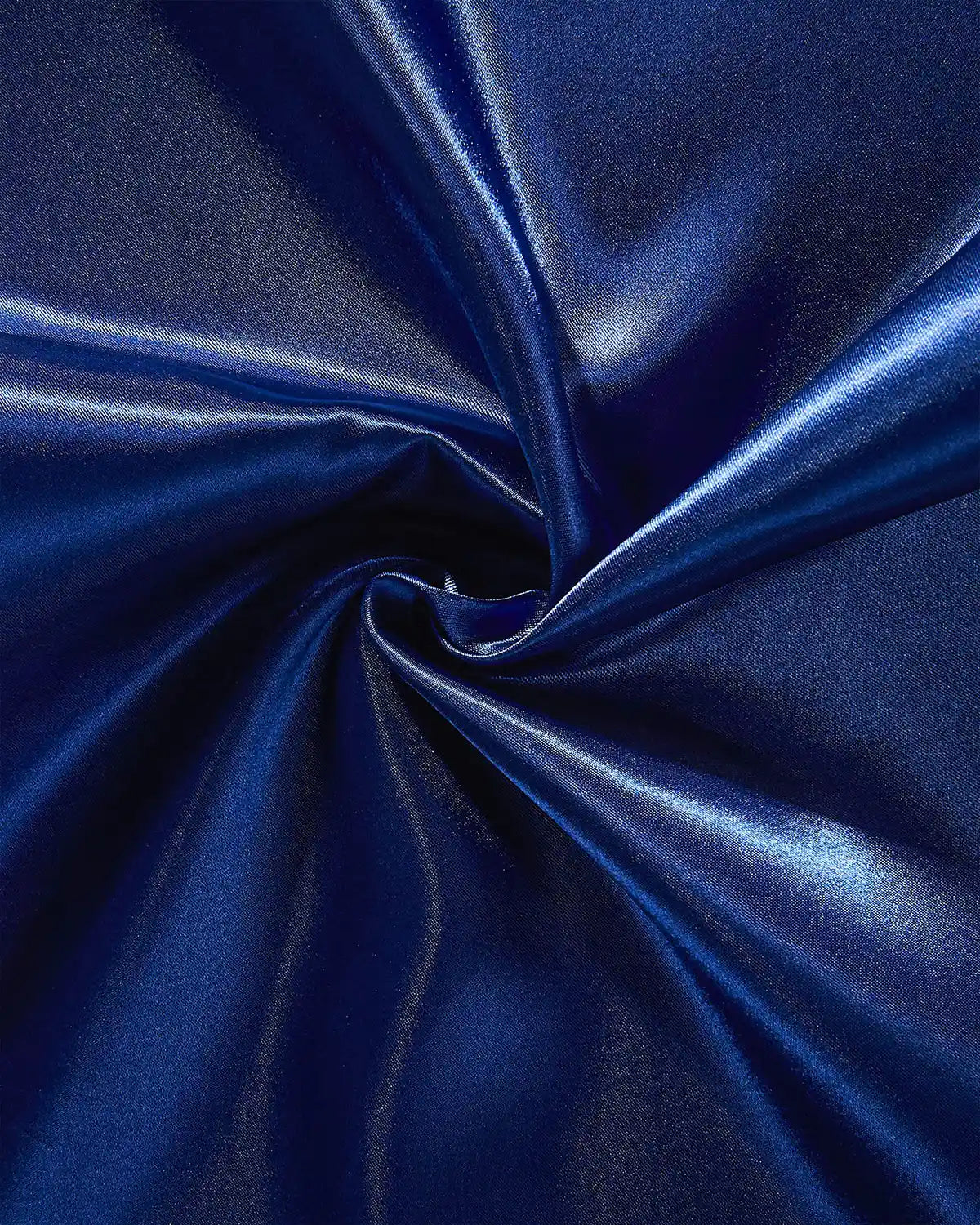 Close-up of blue satin fabric with a swirl pattern