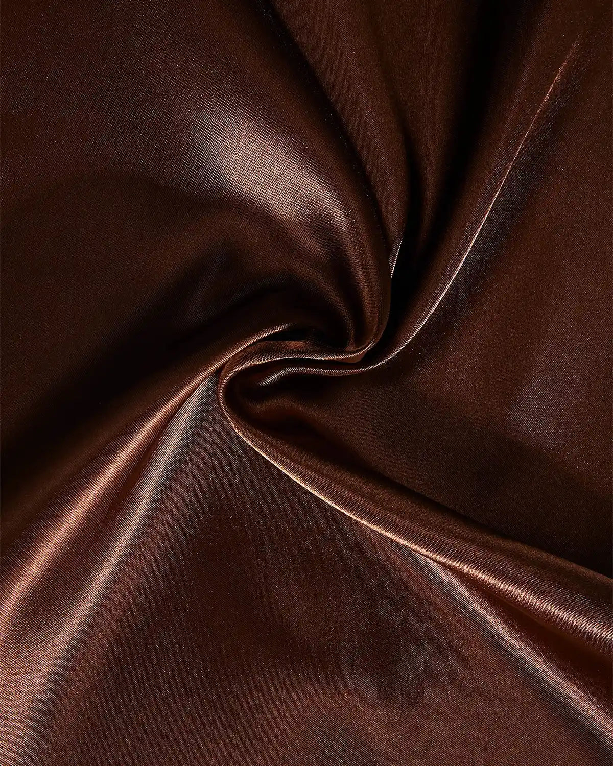 Close-up of espresso coloured satin ribbon with a swirl pattern