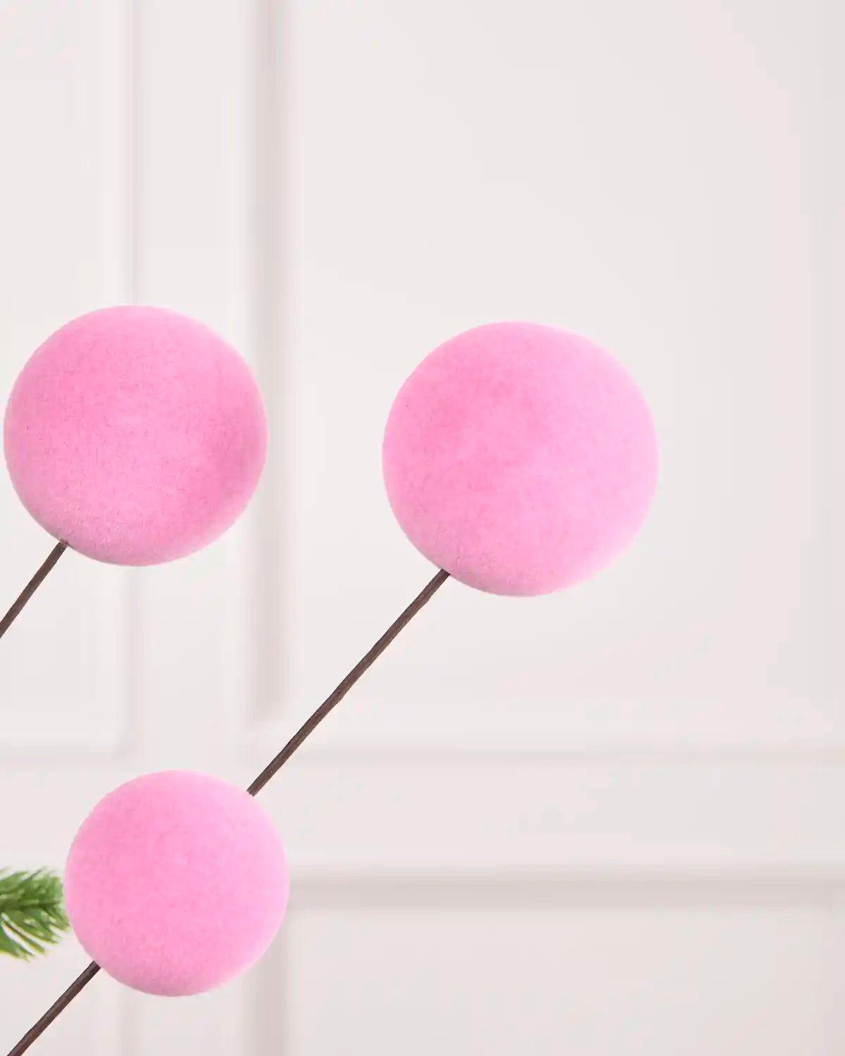 Close-up of pink Velvet Bauble Picks on brown stems