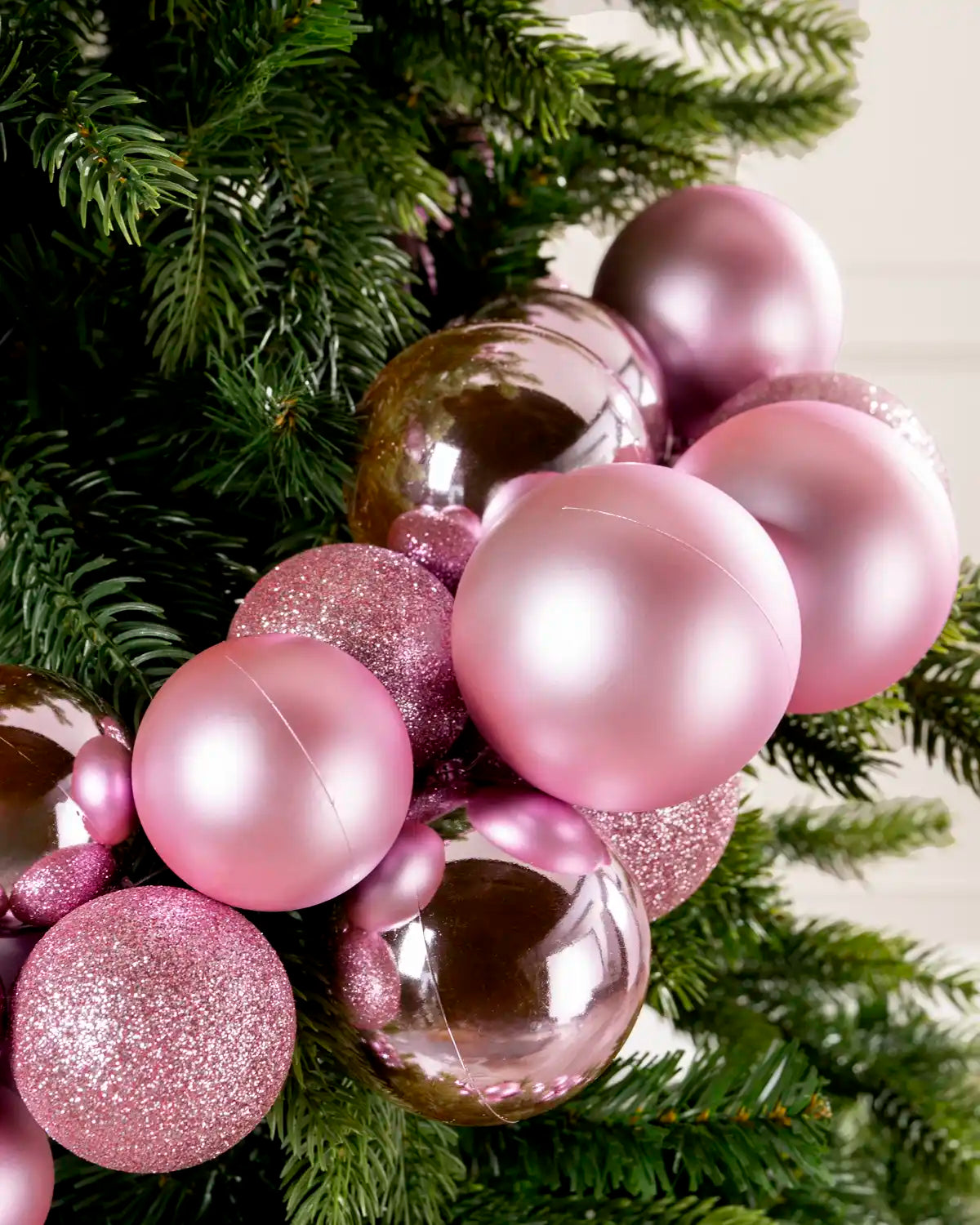 Close-up of pink baubles in a Pink Bauble Cluster Arch