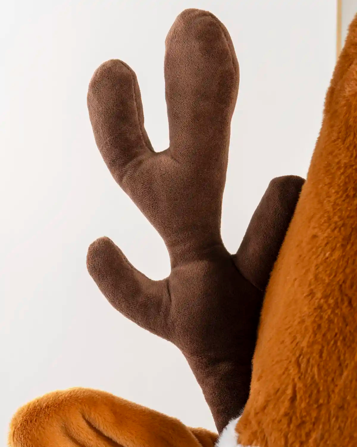 Close-up of plush reindeer antler and ear details