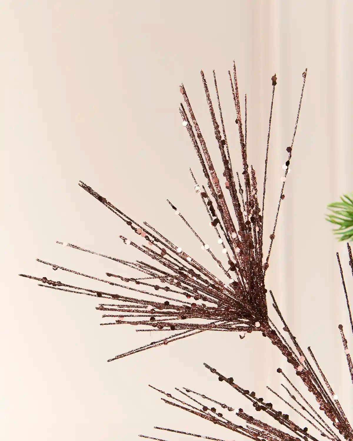 Close-up of the  Espresso  Glitter Firework Spray, showing thin glitter-covered stems
