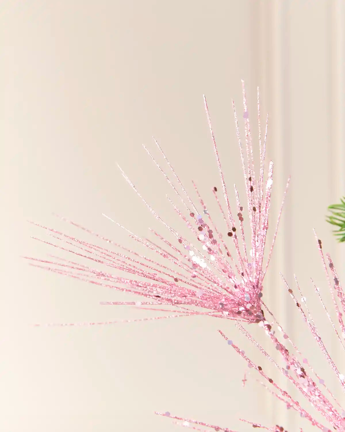 Close-up of the Pink Glitter Firework Spray, showing thin glitter-covered stems
