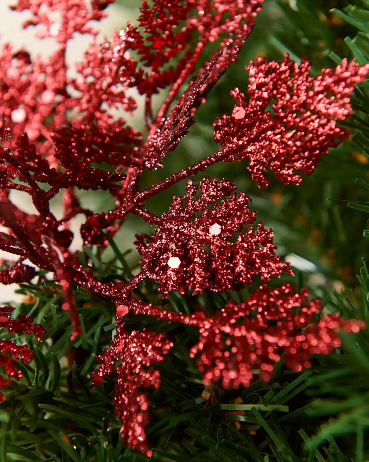 Close-up of the Red Glitter Leaf Pick leaves showing the red glitter and sequins.