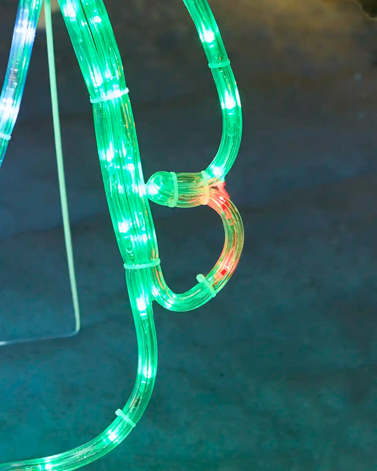 Close-up of the pre-lit gonks arm in green LED lights