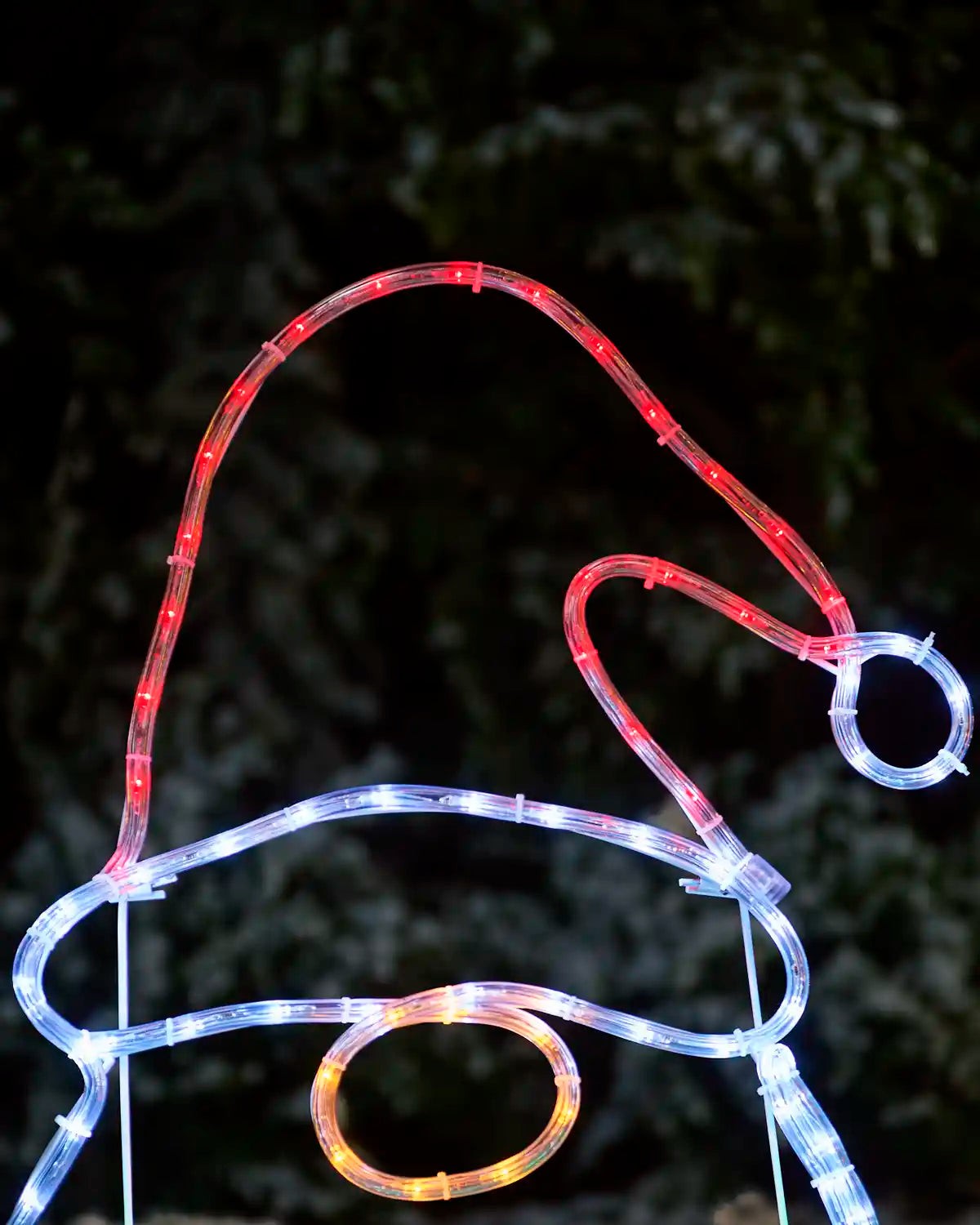 Close-up of the pre-lit gonks christmas hat with a red hat and white tip. 