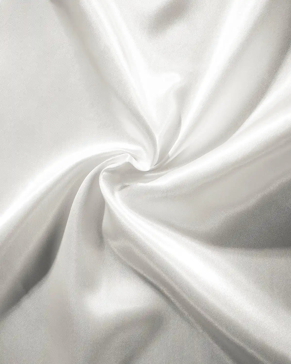 Close-up of white fabric in a swirl pattern
