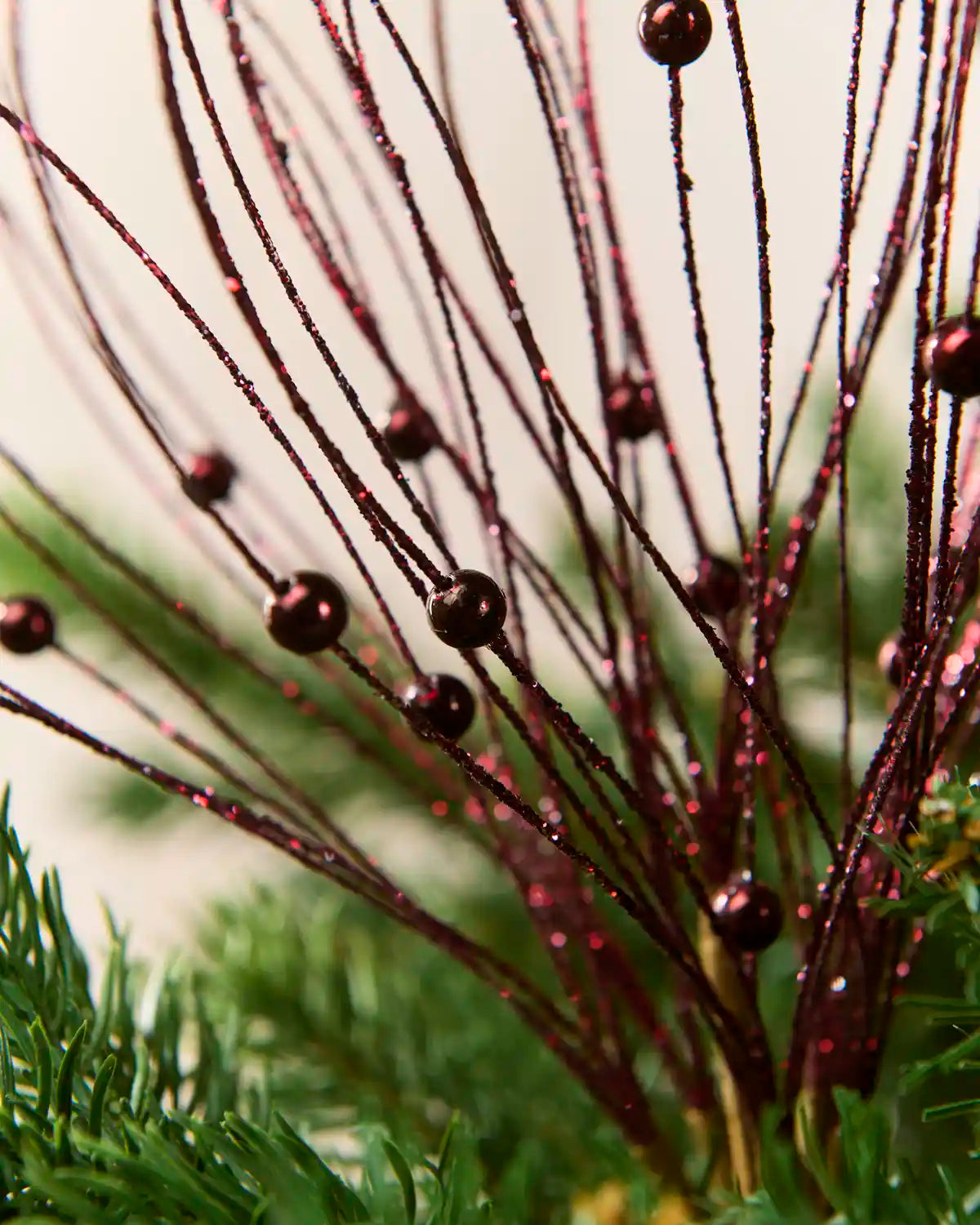 Close up Burgundy Glitter Nest Christmas Tree Pick showing the glitter details and Burgundy balls