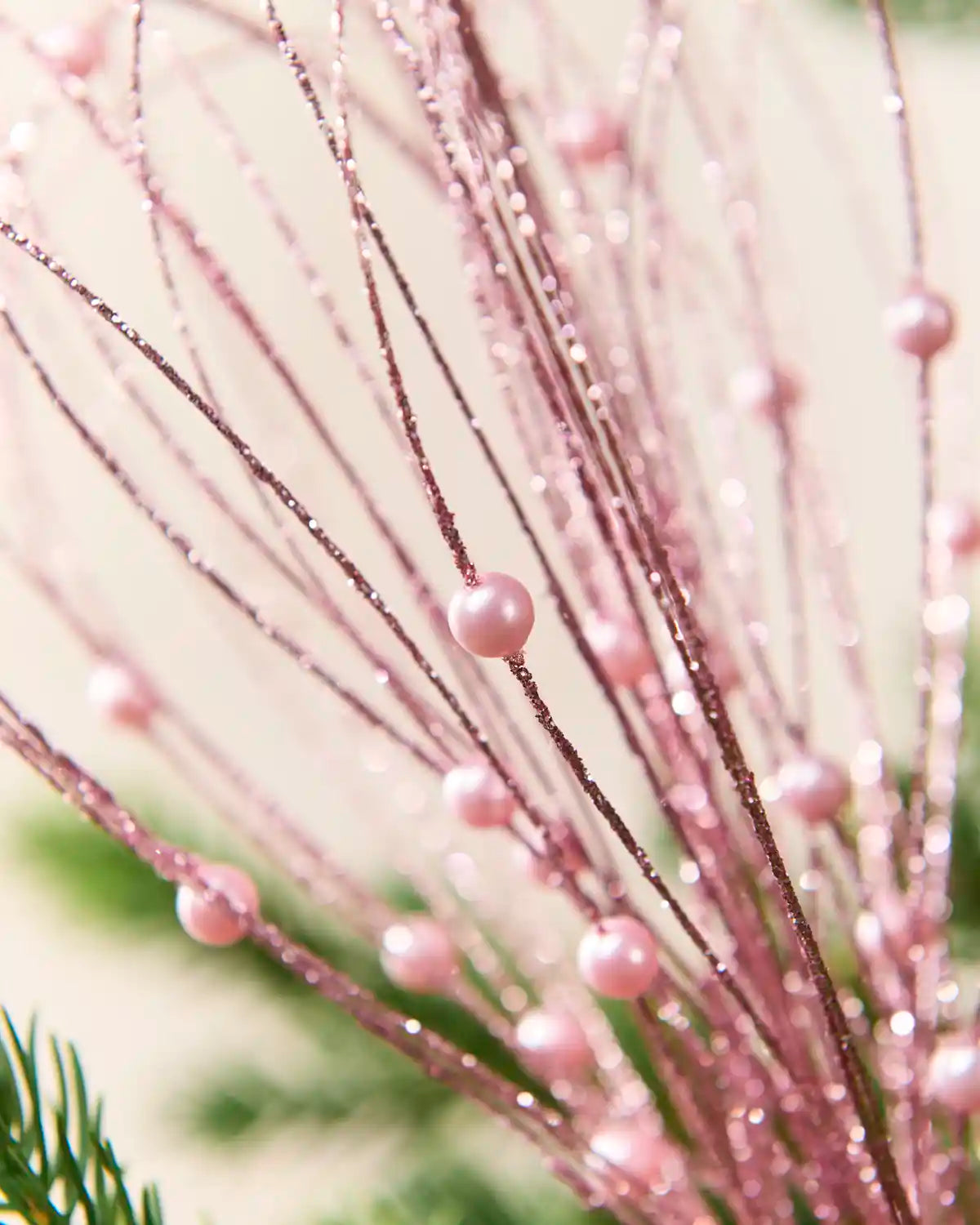 Close up Pink Glitter Nest Christmas Tree Pick showing the glitter details and Pink balls.