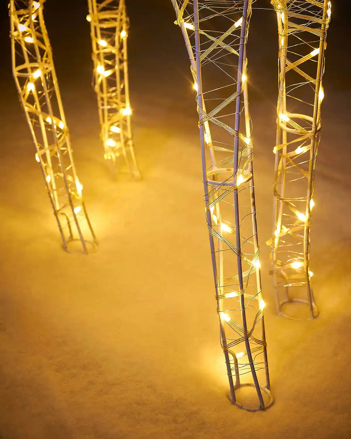 Close up of LED stag legs on a snowy floor