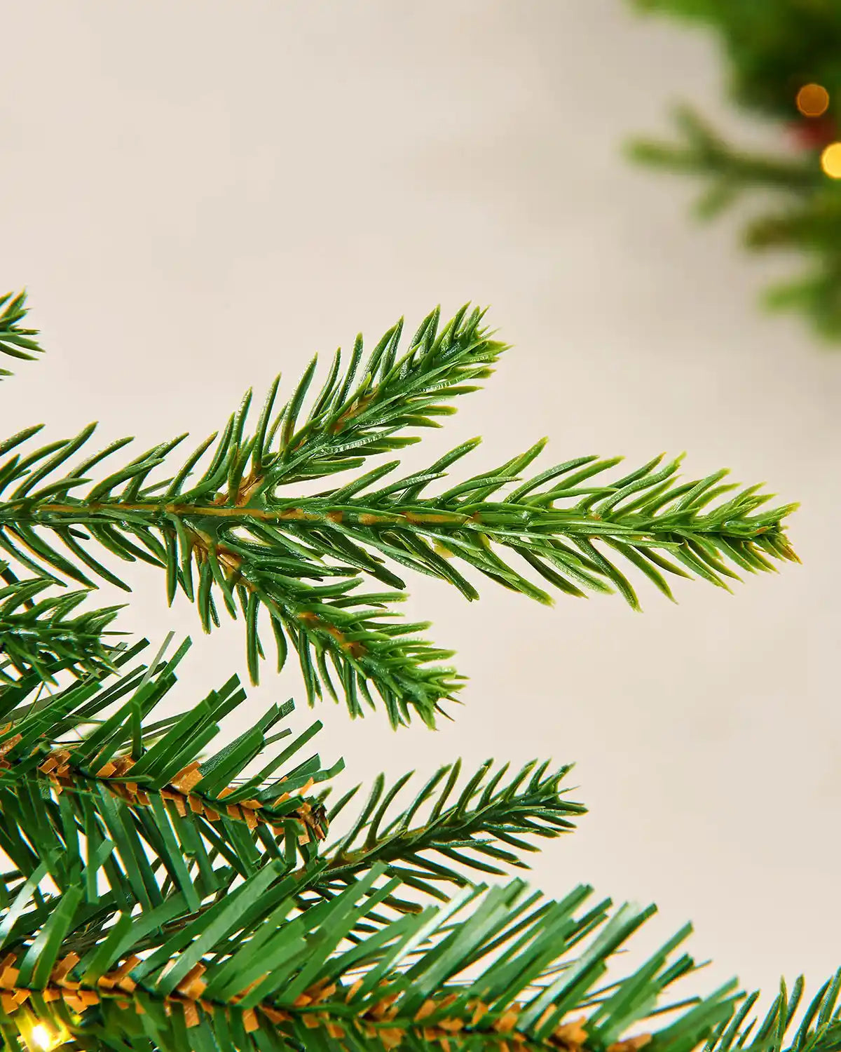 Close up of PVC and PE tips on Pre-Lit Multi-Function Douglas Fir Garland, 9 ft
