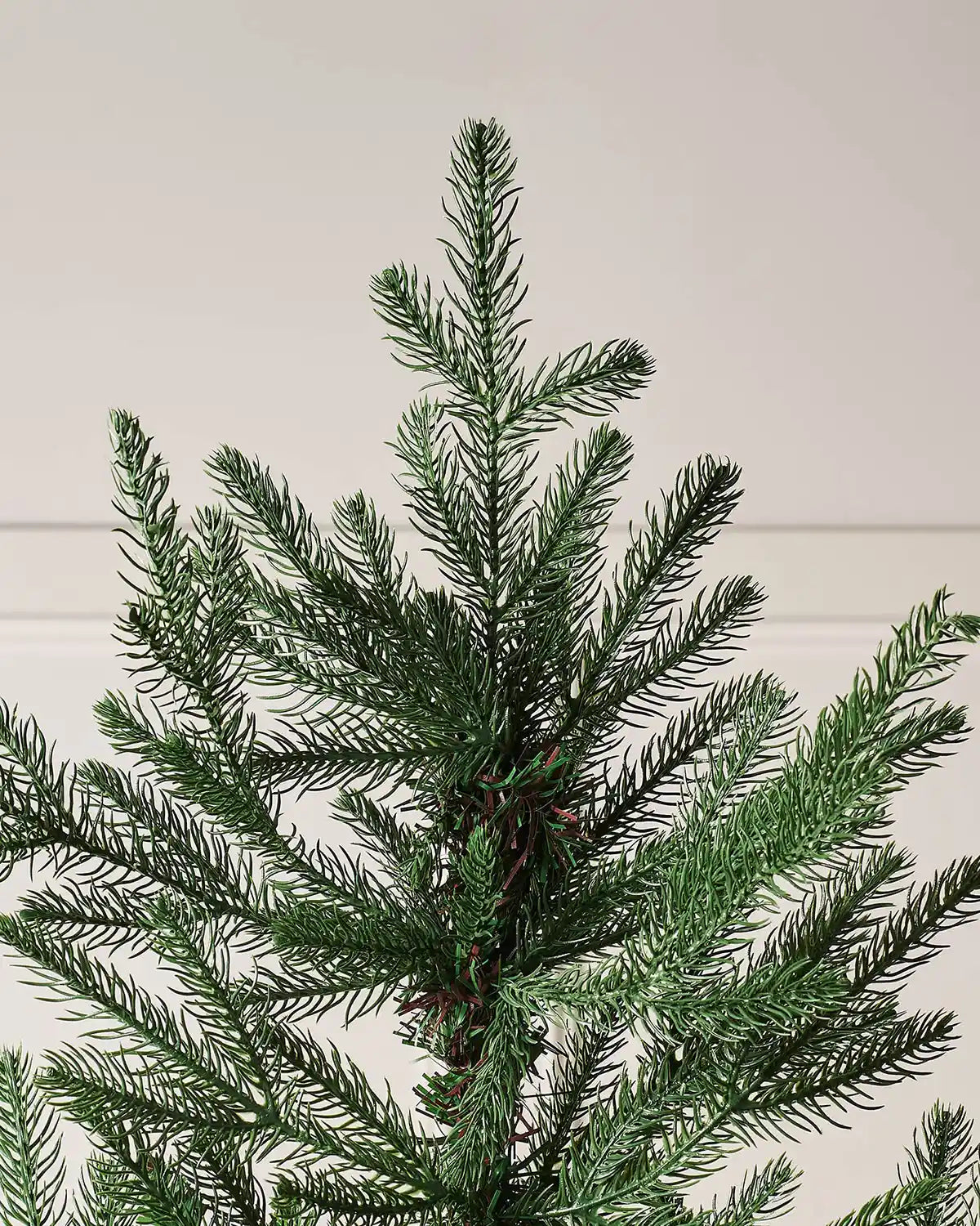Close up of PVC and PE tips on a Dark green Christmas tree 