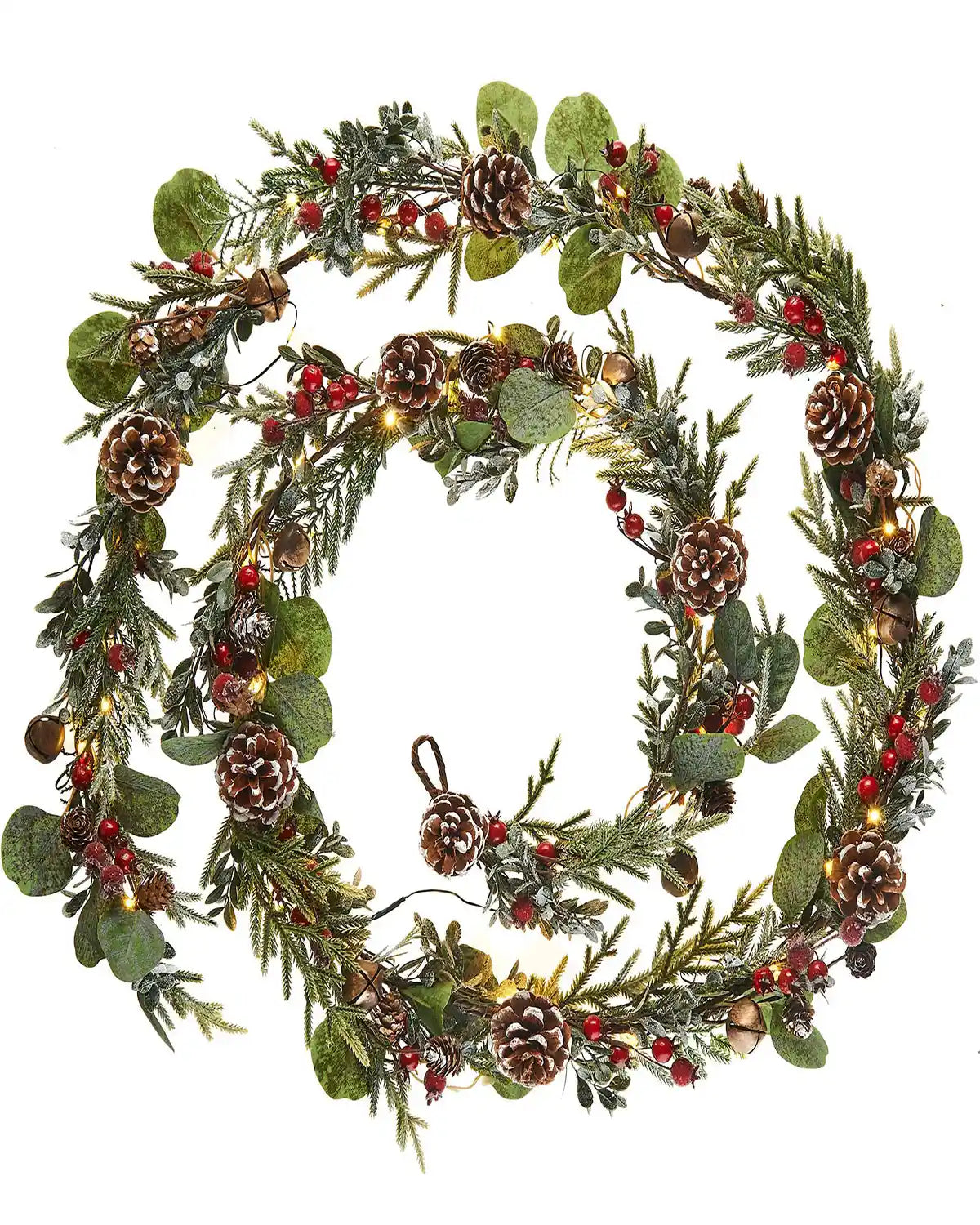 Decorative garland with greenery, pinecones, and red berries on a white background