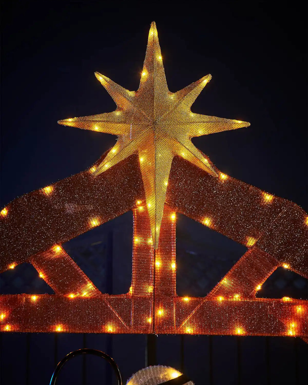 Decorative star with lights on a dark background