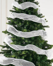 Decorative white and gold mesh ribbon on a Christmas tree