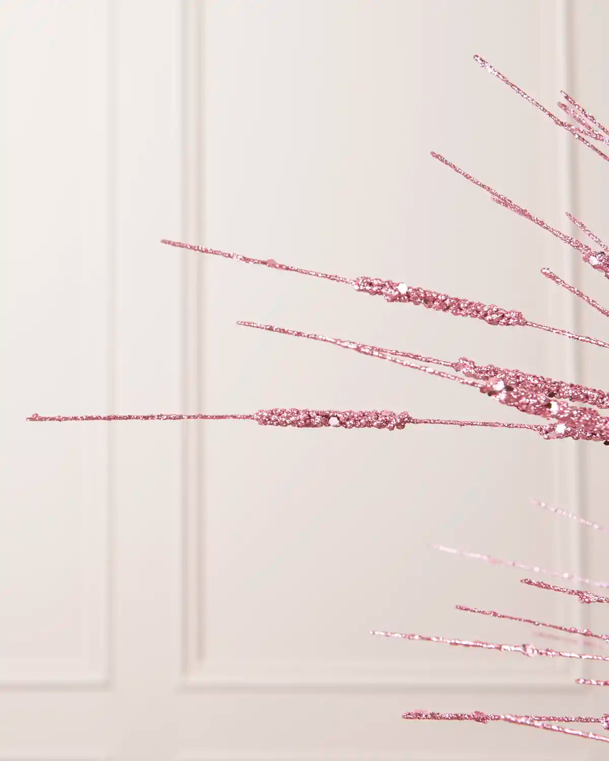 Detailed close-up of slender Pink glitter stems with textured sections from the Glitter Wispy Spray
