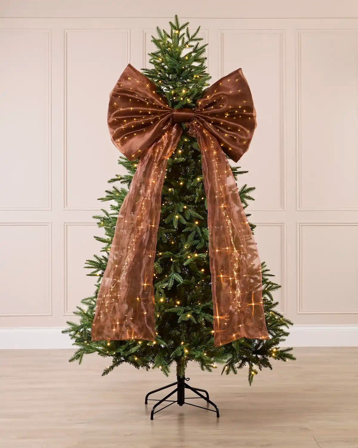 Espresso brown pre-lit Christmas bow displayed on a decorated Christmas tree.