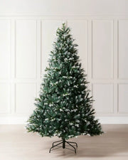Evergreen Snow Flocked Tip Christmas Tree, 6 ft on a panel textured background
