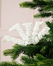 Glitter Spiral Picks, White displayed on a Christmas tree