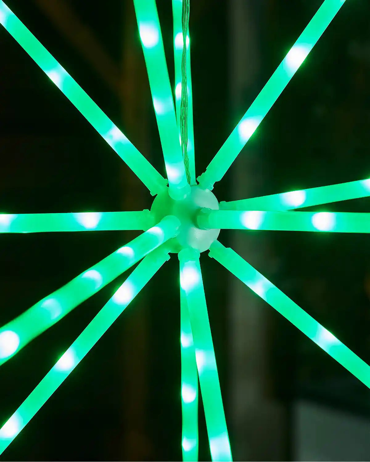 Green LED light wheel on a dark background