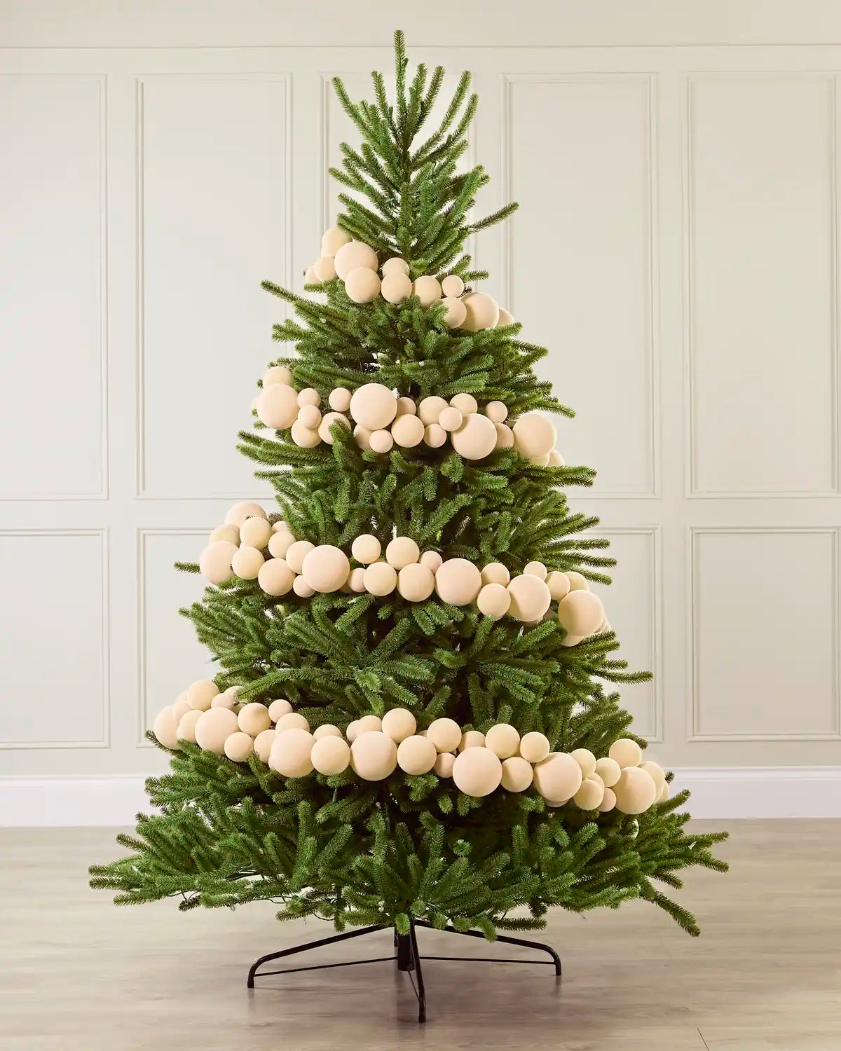 Latte Velvet Bauble Garland decorating a Christmas tree, featuring latte velvet baubles arranged along the garland