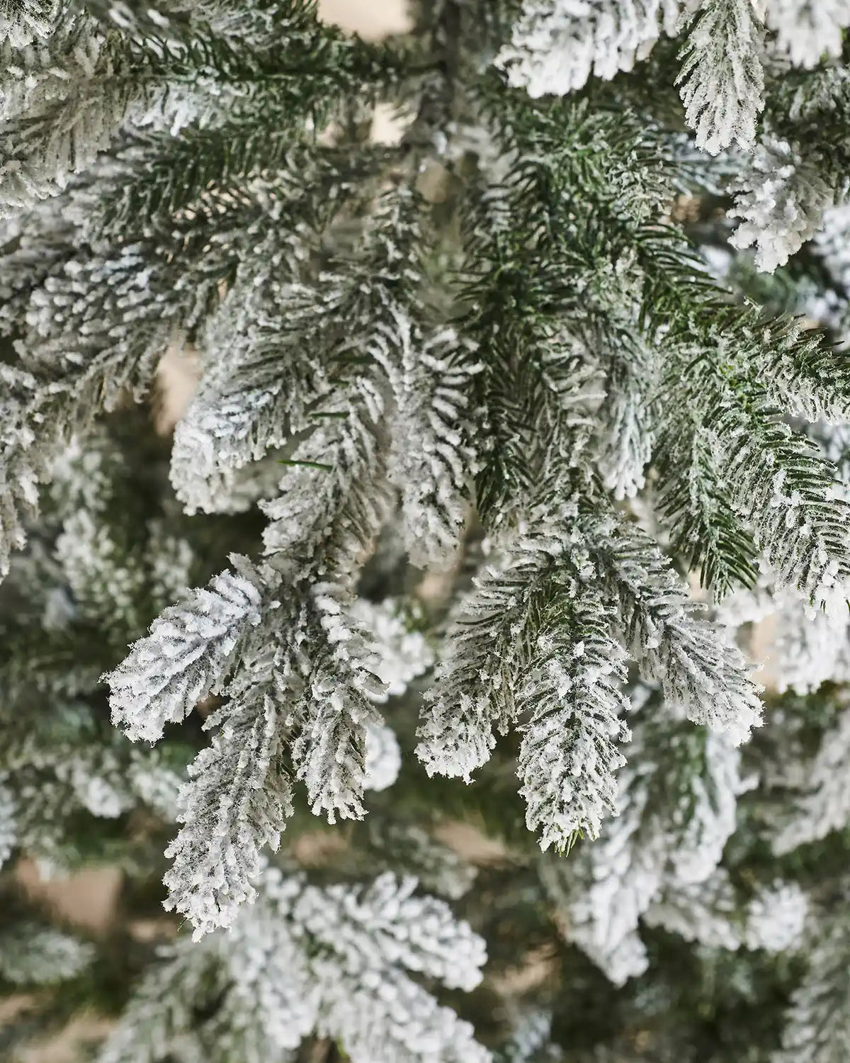 Close up of the PVC and PE tips Luxury Snow Flocked Christmas Tree, 7 ft
