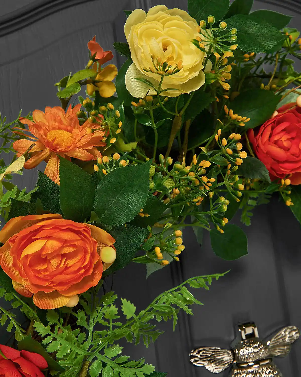 Orange, 28 Inch, Artificial Floral Rose Spring Wreath on a Black door, flowers close up shot.