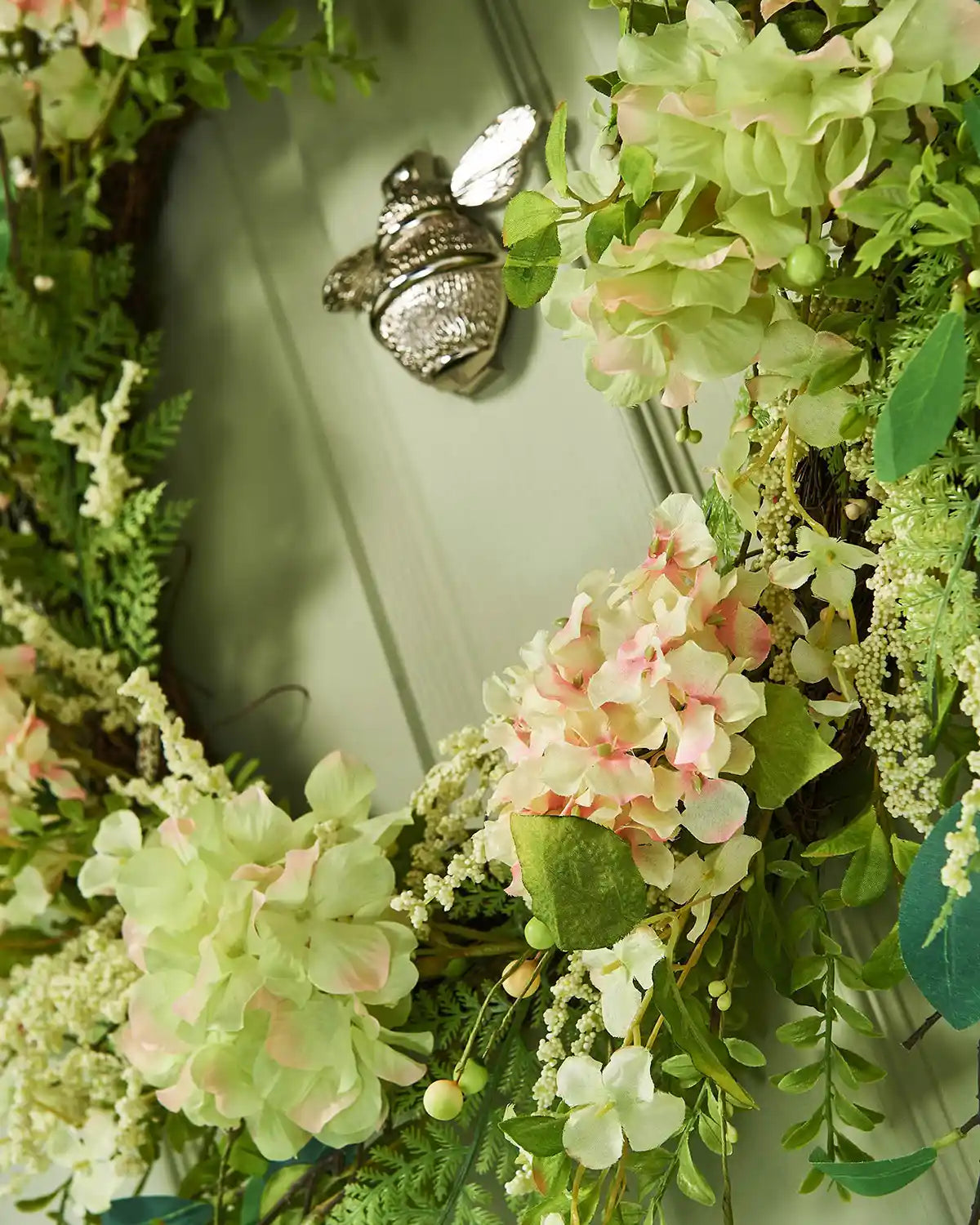 Peach and White, 28 Inch, Artificial Floral Hydrangea Spring Wreath,  on a Green door, bottom right close up.