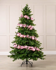 Pink Bauble Garland decorating a Christmas tree