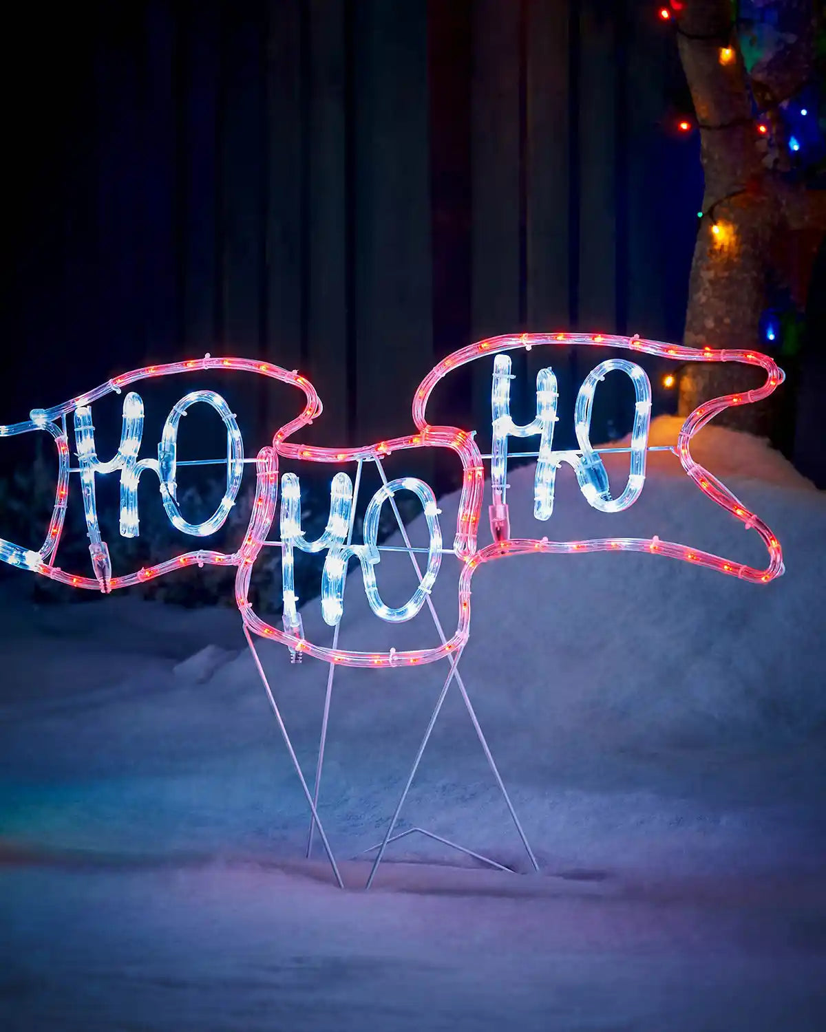 Close up of the HO HO HO banner on Santa's plane part of Pre-Lit Animated Flying Santa, Silhouette, 190 cm