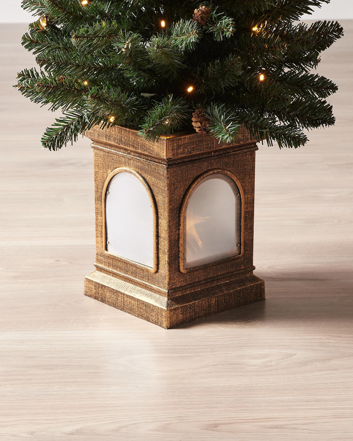 Pre-lit 46 cm (18 inch) potted Craford Pine Christmas tree with 150 lush PVC tips and 80 warm white LED lights—compact, elegant, and glowing with festive warmth, perfect for mantles, tabletops, or cosy indoor corners.