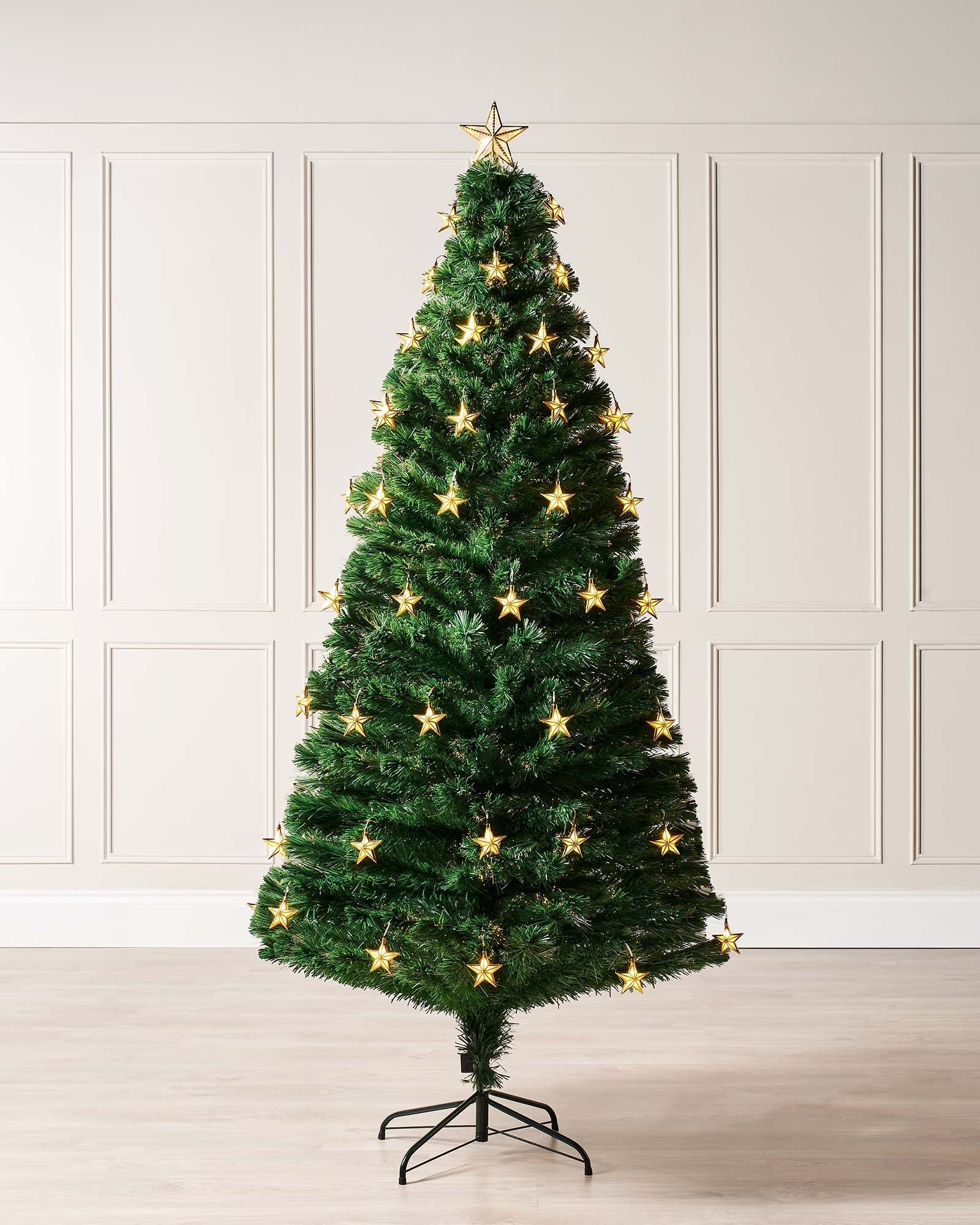 7-foot pre-lit green artificial Christmas tree with 270 warm white fibre optic tips and 60 gold LED star decorations, featuring 8 lighting functions and an LED star topper, displayed indoors against a white background.