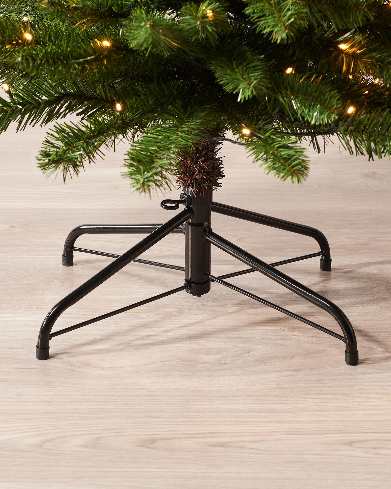 Pre-lit green pencil Christmas tree with slender shape, 400 mixed PE and PVC tips, and warm white LED lights, displayed indoors against a white background.
