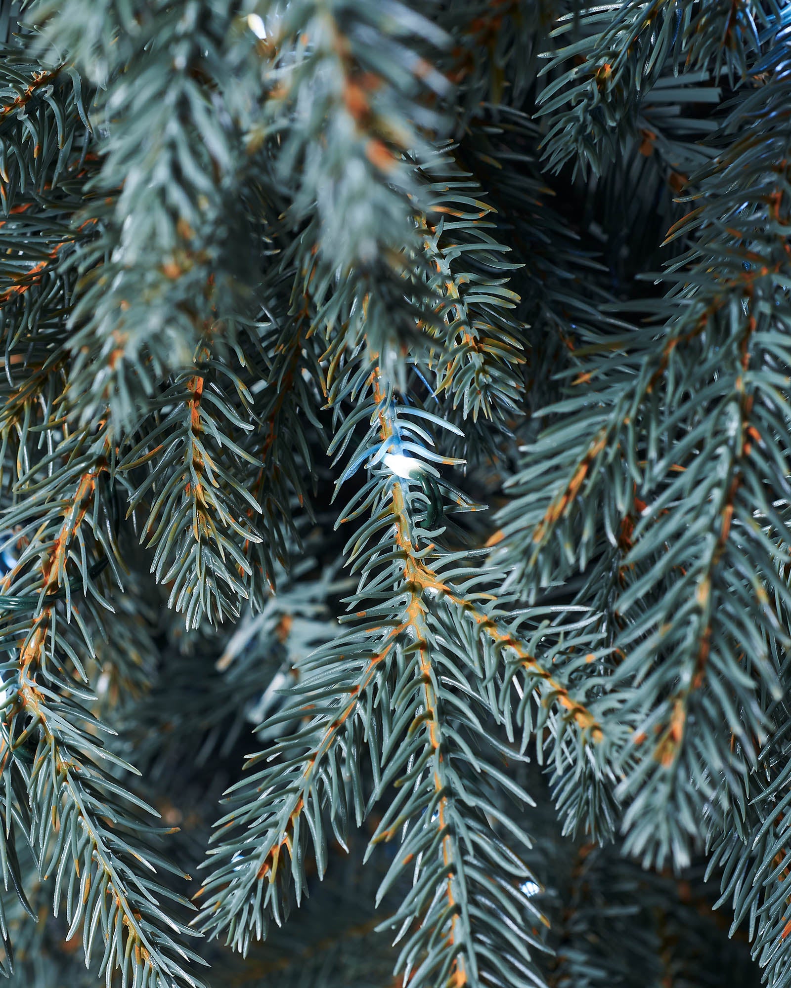 Pre-lit Blue Mixed Pine Christmas tree with lifelike mixed tips and hinged branches for easy setup. Features dual LED warm white and white lights with multi-function memory controller, displayed against a neutral background.