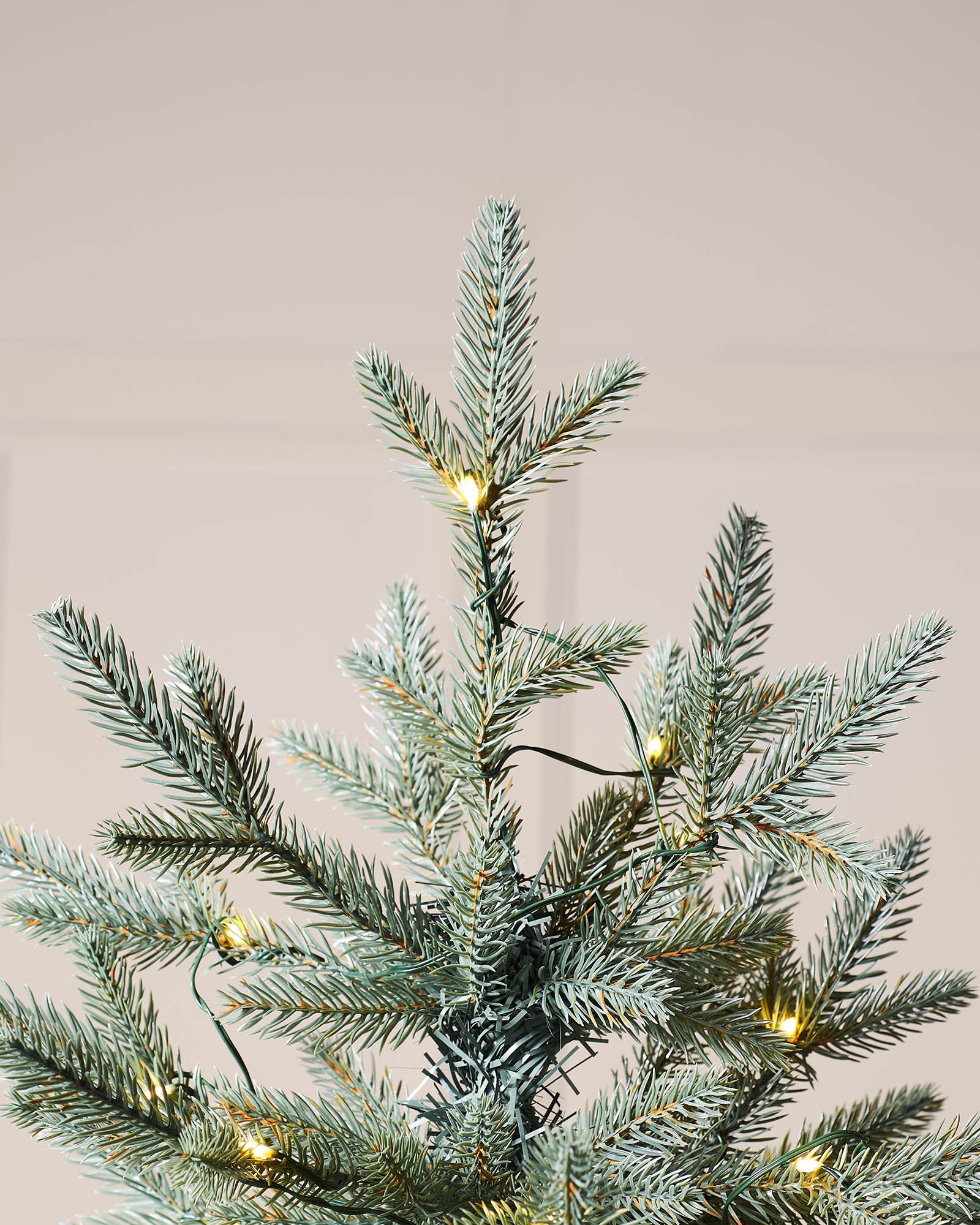 Pre-lit Blue Mixed Pine Christmas tree with lifelike mixed tips and hinged branches for easy setup. Features dual LED warm white and white lights with multi-function memory controller, displayed against a neutral background.