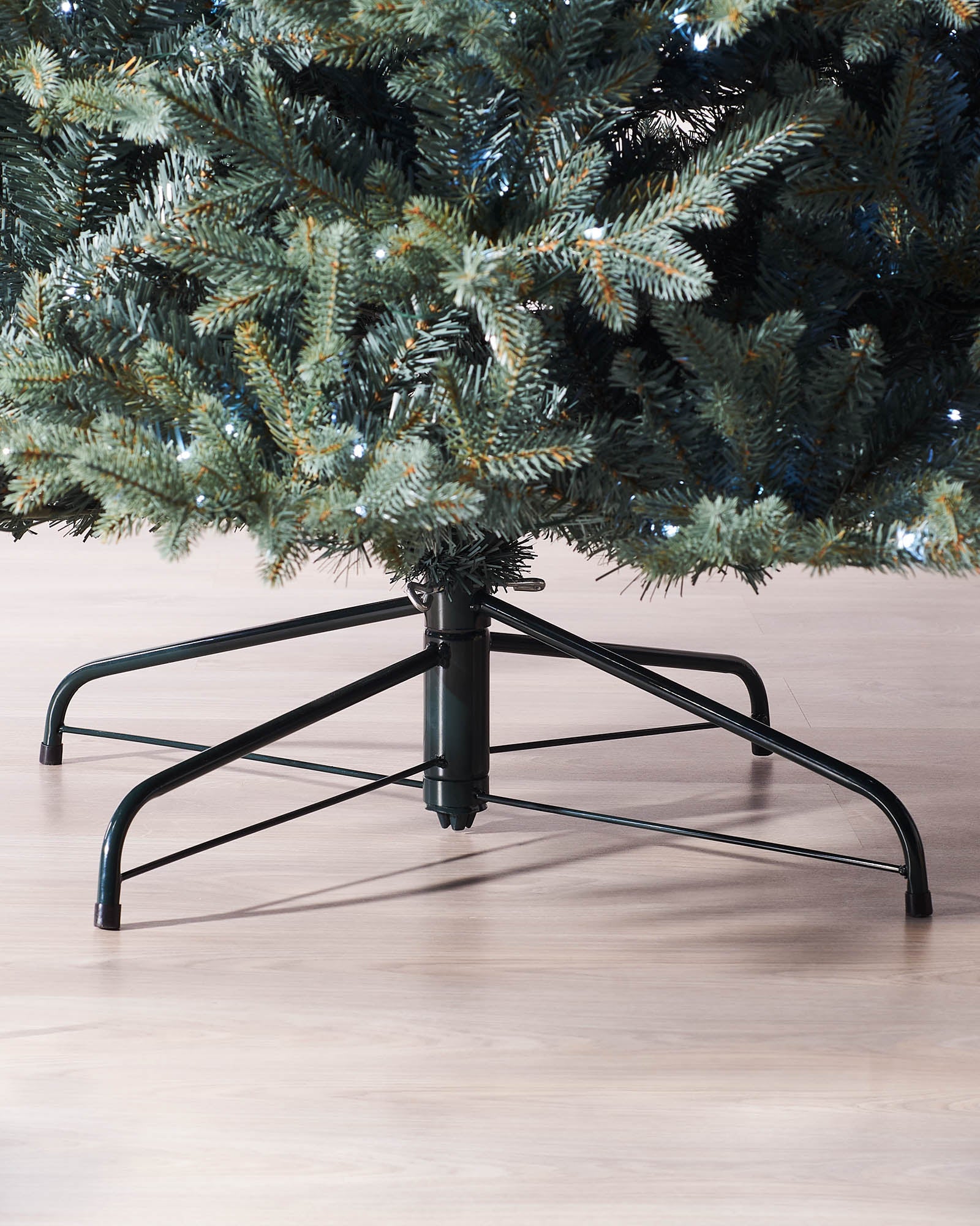 Pre-lit Blue Mixed Pine Christmas tree with lifelike mixed tips and hinged branches for easy setup. Features dual LED warm white and white lights with multi-function memory controller, displayed against a neutral background.