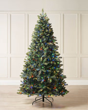 Pre-lit mixed pine artificial Christmas tree with dual LED lights in warm white and multicolour, displayed against a plain background."