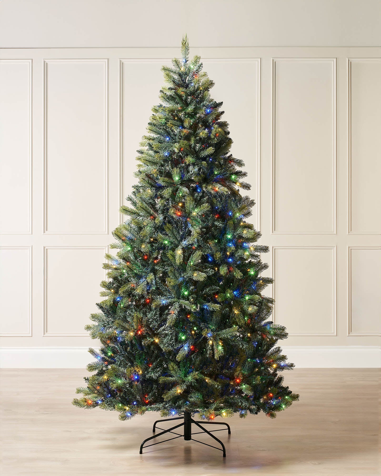 Pre-lit mixed pine artificial Christmas tree with dual LED lights in warm white and multicolour, displayed against a plain background."