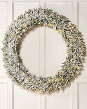 Pre-Lit Snow Flocked Natural Fir Majestic Wreath, 1.5 m on panel textured background