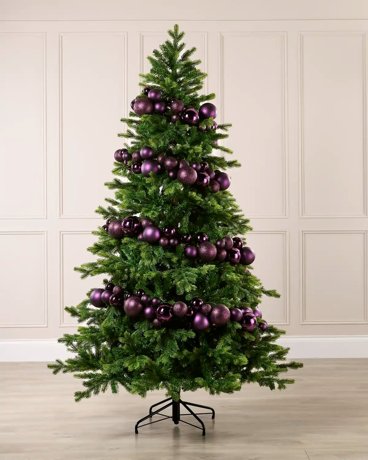 Purple Bauble Garland decorating a Christmas tree