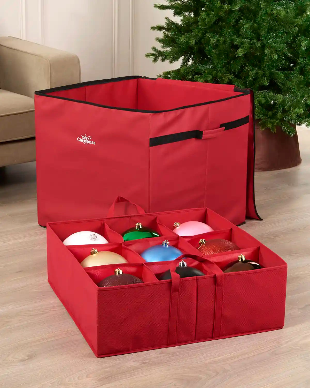 Red 34-piece oversized bauble and Christmas decoration storage bag shown open, with individual compartments holding colourful baubles